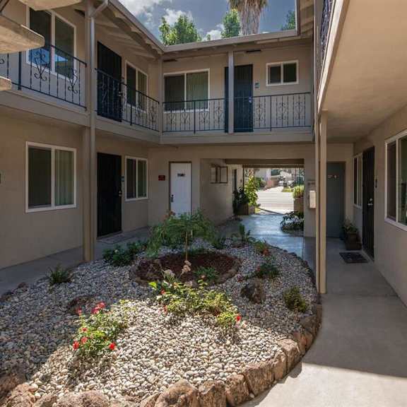 Buena Vista Apartment building with a staircase to the second floor