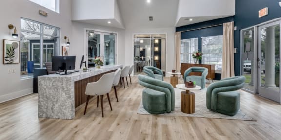 a living room with a kitchen and a dining room with chairs  at Vibe on Riverside, Austin, Texas