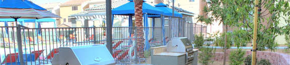 Community gas grills near the pool at CHANDLER APARTMENT HOMES, Las Vegas, NV, 89139