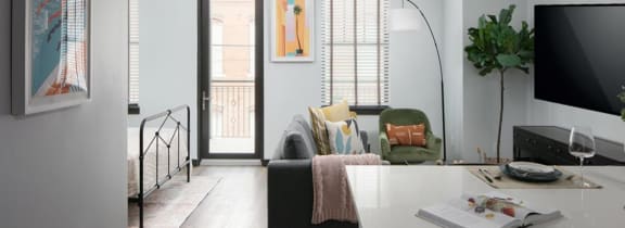 a rendering of a living room with a couch and a coffee table at Casa Marti, Tampa