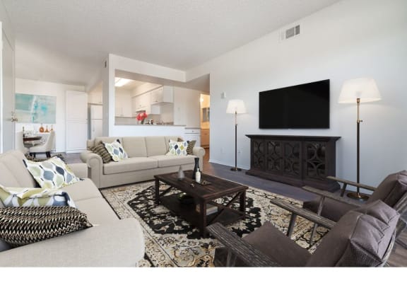 a living room with couches and a coffee table at Costa Mesa Family Village, Costa Mesa, CA 92627