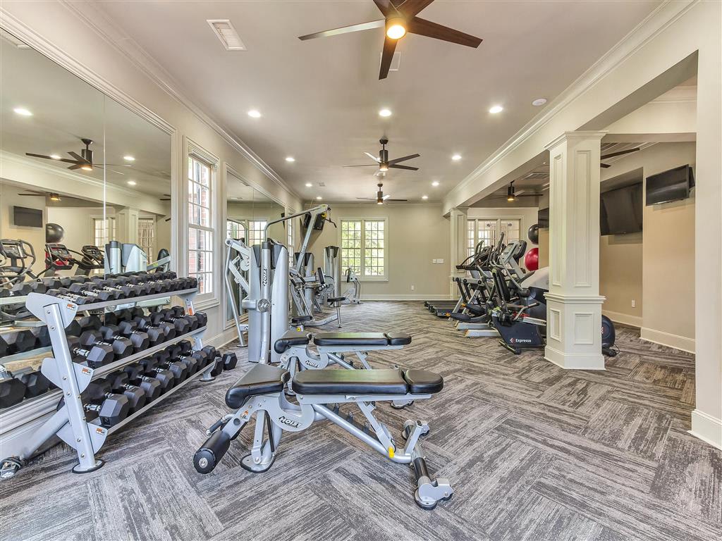 The Caruth Premier Townhome Apartments fitness center - Dallas, TX