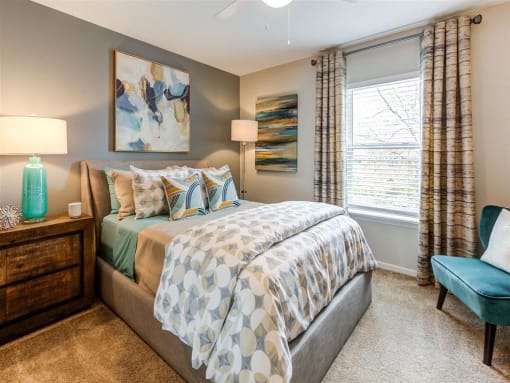 Bedroom With Ceiling Fan at Orion Arlington Lakes, Illinois