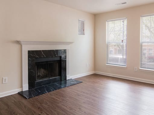 3 bedroom townhome living room with chimney, Crawford Square Apartments, Pittsburgh, PA