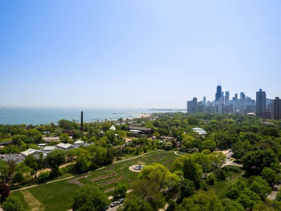 an aerial view of the city and the lake at the Belden Stratford in Chicago, Illinois 60614