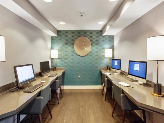 a room filled with lots of computers on top of desks Prospect Place Apartments in Hackensack, NJ