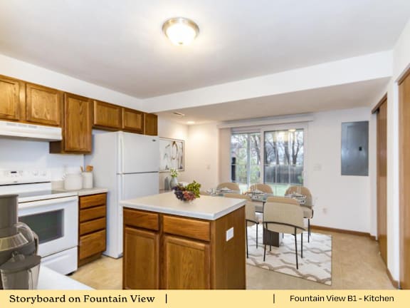 A kitchen with a white fridge and wooden cabinets.