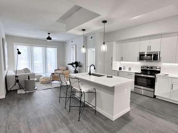 Large island and living room in model