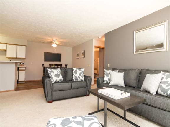 Living room with plenty of natural light at Eagle Run Apartments