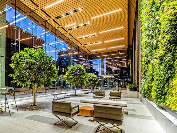 a view of a lobby with tables and chairs and plants at 520 Lofts, Allentown, PA 18101