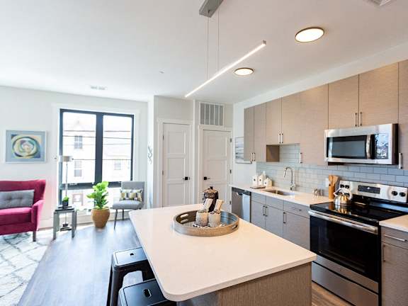 Luxury Vinyl Plank Flooring In Kitchen And Living Room at Walnut Street Commons, Allentown, 18101