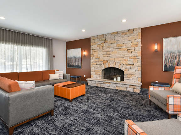 Pines of Burnsville - Clubhouse Seating Area & Fireplace