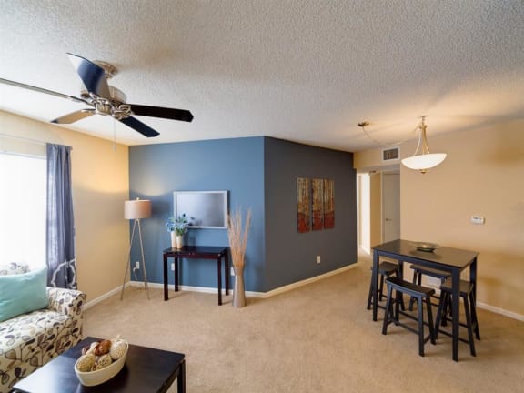 Carpeted Living Room at Holly Cove Apartments, Orange Park, 32073
