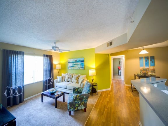 Decorated Living Room With Natural Light at Leigh Meadows Apartments, Jacksonville, Florida