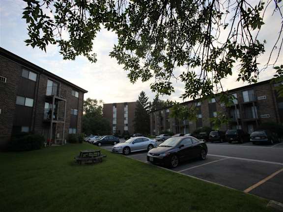 parking lot and Apartment building