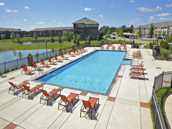 Outdoor Swimming Pool with Large Sundeck at Prairie Lakes Apartments, Peoria, Illinois