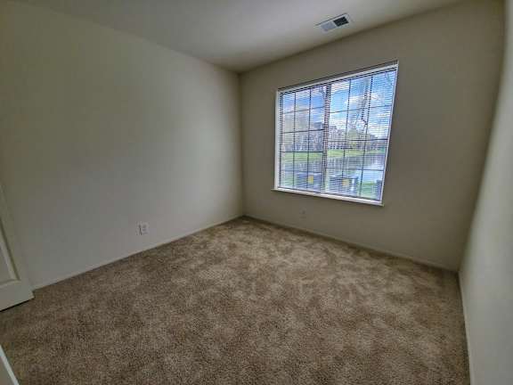 11109 Bedroom 1 at Stone Ridge Apartments in Wixom, MI 48393