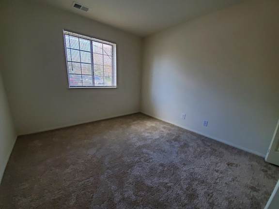 11109 Bedroom 2 at Stone Ridge Apartments in Wixom, MI 48393