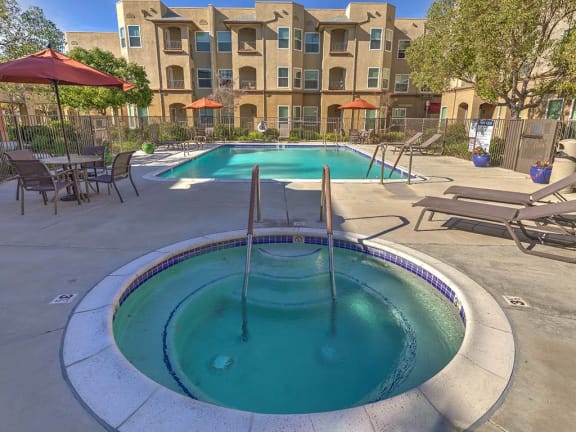 Spa and Pool with lounge chairs at VINTAGE AT BOUQUET CANYON, California, 91350