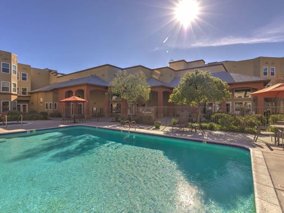Pool with tables and seating at VINTAGE AT BOUQUET CANYON, Santa Clarita, CA 91350