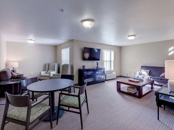 Room with TV and seating at VINTAGE AT BOUQUET CANYON, Santa Clarita, 95405