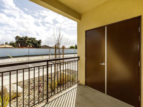 Spacious balcony to put outdoor furniture and extra storage on the side doors