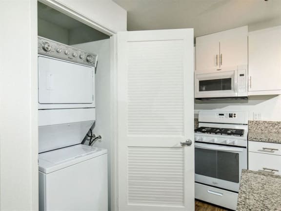 Washer and dryer on the side of the refrigerator