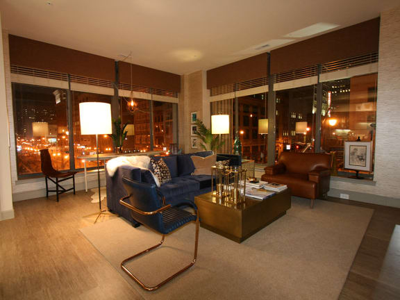 Living room at night at The Citizens Apartments