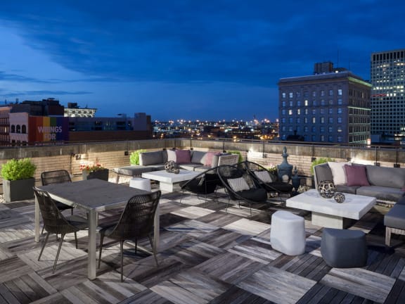 Tables chairs on rooftop at The Citizens Apartments