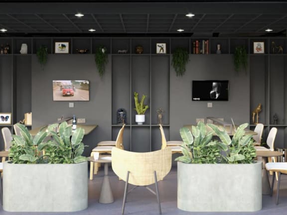 a room with tables and chairs and potted plants