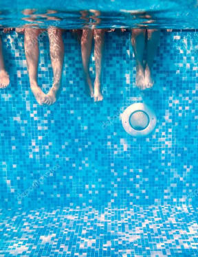 feet of a person in a swimming pool