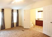 Thumbnail 6 of 21 - Master Bedroom With Double Doors at Heritage Oaks Rental Homes in Lincoln, NE