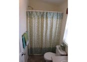 Thumbnail 11 of 21 - Bathroom Shower With Curtain at Heritage Oaks Rental Homes in Lincoln, NE