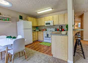 Thumbnail 26 of 37 - Naturally-lighted Kitchen at Commons at Timber Creek, Portland, 97229