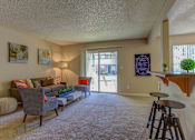 Thumbnail 24 of 37 - Carpeted Living Room at Commons at Timber Creek, Portland, Oregon