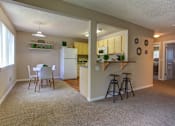 Thumbnail 25 of 37 - Living Room and Breakfast Bar at Commons at Timber Creek, Portland, 97229