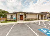 Thumbnail 9 of 27 - Leasing Center External View at CLEAR Property Management , The Lookout at Comanche Hill Apartments, San Antonio, TX, 78247