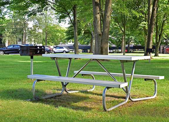 Grills and Picnic Table at Woodland Place, Midland