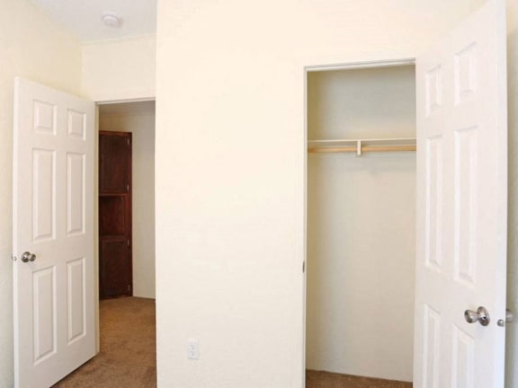 Hallway Storage Near Bedroom at Heritage Oaks Rental Homes in Lincoln, NE