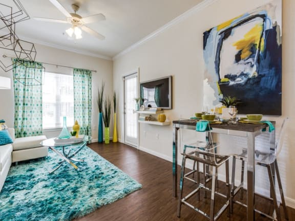 Wood-inspired plank flooring in living areas at CLEAR Property Management , The Lookout at Comanche Hill, San Antonio, TX