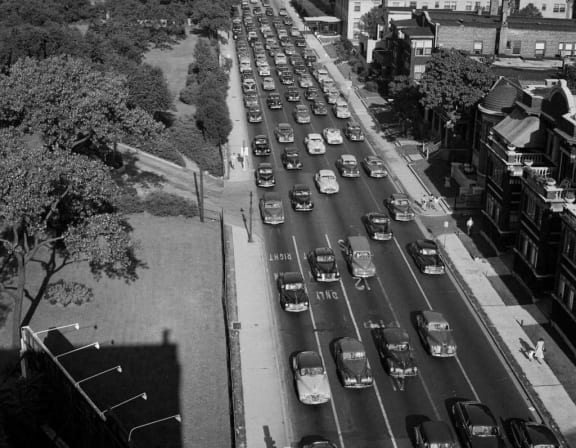 an overhead view of traffic on a city street