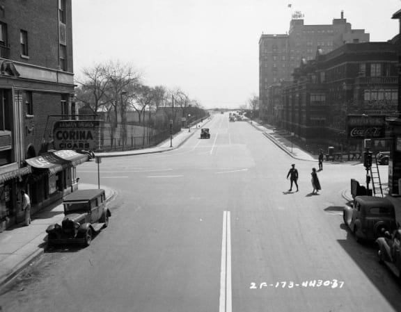 an old black and white photo of a city street