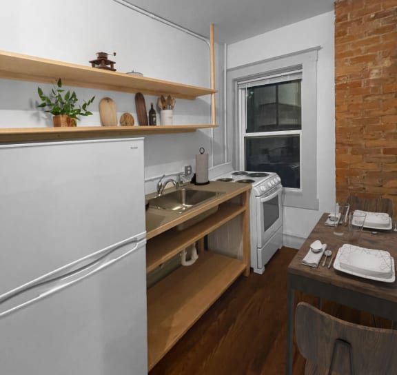 a bedroom with a bed and a door to a bathroom