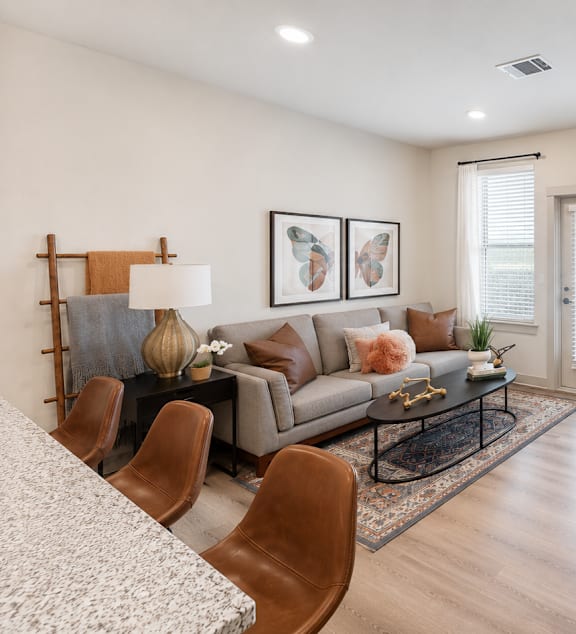 Bright A1 apartment living room with open floor plan at The Westerly Apartments in Midlothian, TX