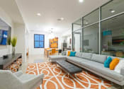 Thumbnail 13 of 39 - Leasing Office with seating area and modern decor at The Equitable Building, Des Moines, IA