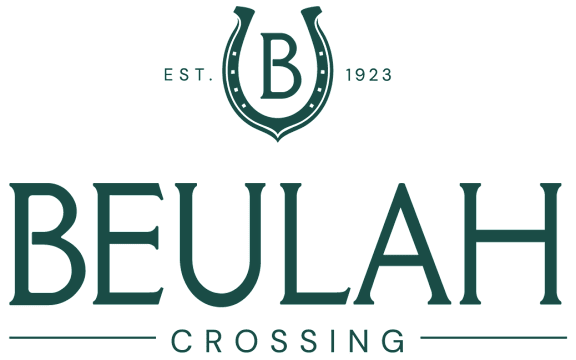 A logo with the text "BEULAH CROSSING" and "EST. 1923" below it.