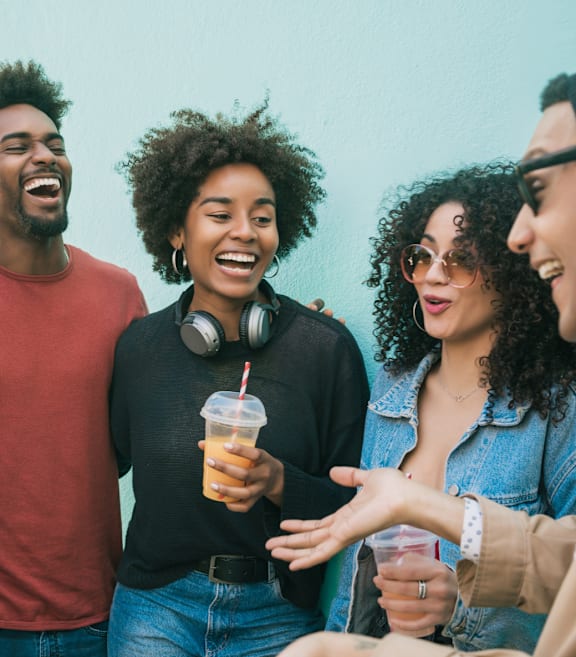 A group of friends are enjoying a drink together.