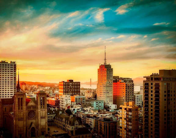 a view of the city skyline at sunset
