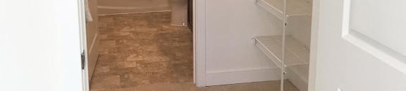 Large walk-in closet with bathroom access