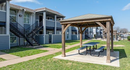 our apartments are equipped with a picnic area and a table